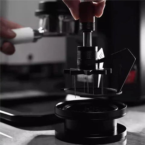 Top Shelf 58Mm Needle Distributor And Wdt Espresso Tool in action adjusting espresso grounds for smooth pulls.