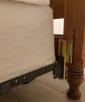 Top Shelf Galvanized Steel Bed Frame Conversion Brackets Four Pack installed on a bed frame, shown from the side angle with mattress.