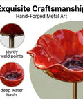 Close-up of red Metal Flower Garden Stake With Bee Bath And Bird Water Bowl showing hand-forged craftsmanship and sturdy welds.