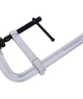 Heavy Duty F Clamp With Removable Swivel Pads And Deep 8 Inch Jaw For Serious Welding And Woodworking Projects That Need Real Grit And Grip To Hold Things Tight, showing a silver clamp with black spindle.