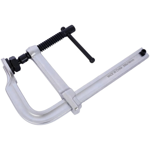 Heavy Duty F Clamp With Removable Swivel Pads And Deep 8 Inch Jaw For Serious Welding And Woodworking Projects That Need Real Grit And Grip To Hold Things Tight, showing a silver clamp with black spindle.