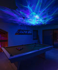 Game room with Ark Lite LED Aurora Projector With Laser Nebula And Galaxy Lighting showcasing blue laser effects on ceiling