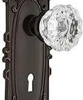 Victorian Door Knob Set With Crystal Interior Knob And Decorative Keyhole Plate, bronze finish, elegant brass style.