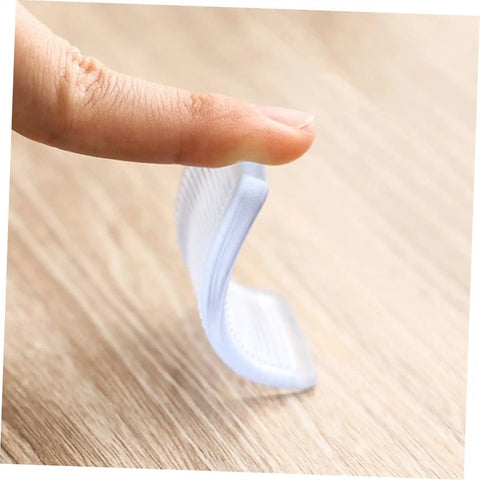 Individual 36 Piece Heavy Duty Leveling Shims For Furniture Stabilizer, flexible rubber wedge being tested with finger.