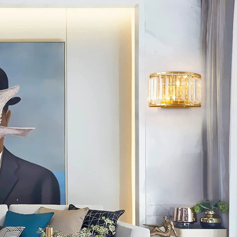 BUNCC Modern Minimalist Metal Wall Sconce, E14 LED Crystal Indoor Wall Light Fixture mounted beside a painting in stylish living room.