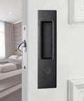 6.3 Inch Privacy Pocket Door Lock Set for Double Barn Doors, silent mortise lock in black, shown on bedroom door.
