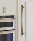 Antique Brass Cabinet Pulls Set, 7.56 Inch Hole Center Zinc Alloy Fluted Drawer Handles on white kitchen cupboard