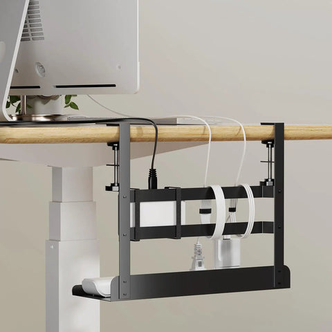 Under Desk Cable Management Tray With No Drill Clamp Mount installed, organizing cables neatly under a desk with protection pads visible.