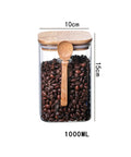Hella Airtight Hand Blown Glass Coffee Canister With Spoon, 1000ML, transparent glass jar filled with coffee beans.