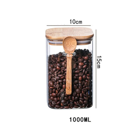 Hella Airtight Hand Blown Glass Coffee Canister With Spoon, 1000ML, transparent glass jar filled with coffee beans.