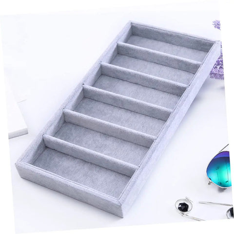 Clean Setup Six Slot Black Sunglasses Display Holder And Jewelry Organizer Box with soft gray fabric compartments.