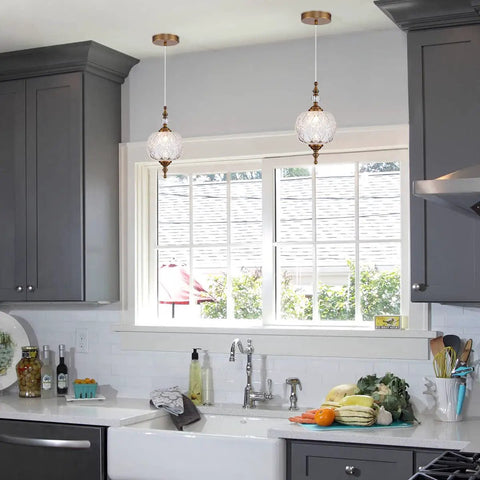 Antique Style Adjustable Glass Pendant Light Fixture With Brass Hardware For Kitchen Island And Dining Room, shown in kitchen