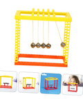 Newton Cradle Balance Balls Kit for DIY Physics Experiments with yellow and orange plastic frame, four silver balls in motion.