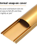 Close-up of gold snap-on cover of Half Round Aluminum Cable Concealer With Self Adhesive Backing for Floor Cord Management