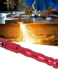 Get That Heavy Duty TIG Welding Wire Feed Pen And Rock Your Shop With This Super Fast Industrial Arc Welding Tool That Handles 1 To 3.2mm Wire Like A Boss While Keeping It Lightweight Ergonomic And Totally Portable For You Pros, red alloy pen with sparks from welding in background.