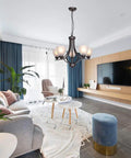 5 Light Shaded Contemporary Chandeliers With Alabaster Glass In Oil Rubbed Bronze Finish hanging in modern living room