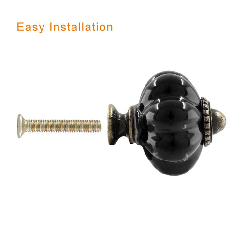 Side view of black ceramic pumpkin knob with screw; Pumpkin Ceramic Cabinet Knobs Set For Black Vintage Drawer Pulls With Mounting Screws 10 Pc Dresser Hardware Cute Mini Closet Door Knobs For Decor For A Fresh DIY Makeover Of Cabinets And Dressers.