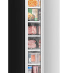 Heavy Duty Full Size Upright Freezer Featuring Game Changing Massive Capacity And Super Convenient Adjustable Shelves For Home Freezer Organization That Hits Different with visible frozen items.