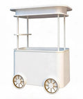 Slick Custom Mobile Food Cart With Roof And Heavy Duty Portable Vendor Display Kiosk For Coffee Snacks Desserts Trade Shows Plus Full Color Branding Makeover viewed from the side with white finish and golden wheels.