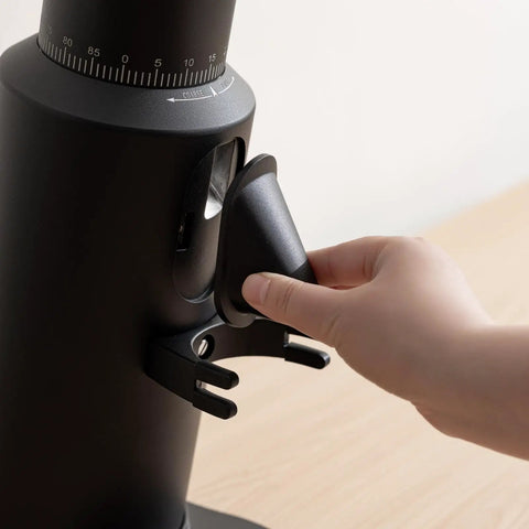 Close-up of the Dope Single Dose Electric Coffee Grinder Featuring 64Mm Titanium Flat Burrs and Stepless Adjustment in black finish.