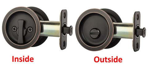 Round Privacy Pocket Door Latch With Aged Oil Rubbed Bronze Finish Easy Install Sliding Door Handle For Bathroom Or Bedroom 2 3 Eighths Backset Universal Fit Locking Passage Pull, showing inside and outside views.