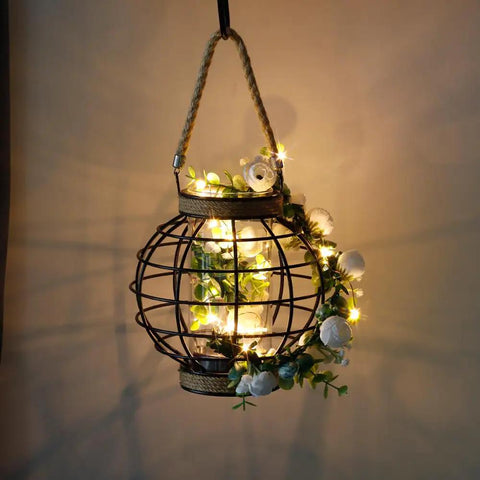 Battery Powered Metal Cage LED Lantern 7.3 Inch Tall Cordless Accent Light With 20 Fairy Lights adorned with flowers