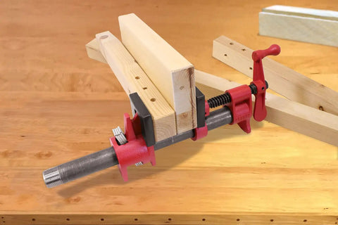 Three Quarter Inch Traditional Pipe Clamps For Woodworking And DIY Projects Incredibly Versatile And Easy To Assemble Workshop Clamp For Carpentry And Home Improvement The Go To Edge Gluing Clamp For Multi Piece Assemblies. 3/4-inch steel pipe clamp on wood edge glue-up