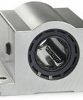 Super Smart Closed Pillow Block Bearing With Self Aligning Linear Ball Bushing Designed For 1.25 Inch Diameter Shaft and End Supported Applications Offering Slick Operation And Rock Solid Support In Heavy Duty Industrial Setups Class L Rating, metallic housing, front view.