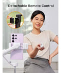 Woman holding detachable remote of ISteady V3 3 Axis Smartphone Gimbal With Magnetic AI Tracking Removable Remote Built In Telescopic Rod