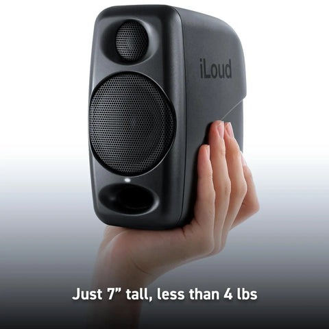 Ultra Compact 50W Wireless Bluetooth Studio Monitors Dual Reference Speakers, handheld black speaker showing size and portability.