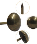 Snag These Top Shelf Antique Bronze Upholstery Tacks For A Slick Vintage Furniture Makeover. Close-up of round bronze tack with pointed tip.