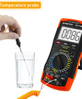 6000-Count True RMS Digital Multimeter measuring liquid temperature with probe, showing AC/DC voltages and ohms features.