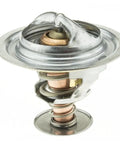 Shop Grade Engine Coolant Thermostat Replacement For Mitsubishi L200 And Diamante Direct Swap Under The Hood Cooling System Fix One Piece Garage Ready Setup viewed from top with metal housing and center valve.