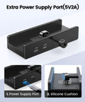 Clamp On USB Hub With External Power Sleek Aluminum 4 Port USB 3.0 Adapter With Three USB A Data Ports And A USB C Port For Monitors Desk Setup Built To Handle Power Hungry Peripherals Black showing power supply port