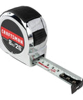Close-up of a Retractable 8M Chrome Tape Measure With Rubber Overmold Grip And Durable Blade Coating, 26 Ft Standout, suitable for DIY projects.