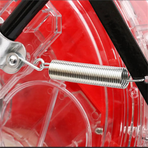 Close-up of a spring mechanism on a Durable Metal Precision Garden Seeder With Clear Seed Storage Box for precise seeding.