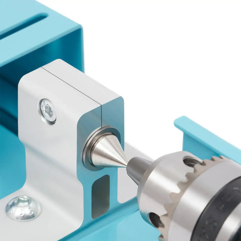Close-up view of the metal chuck on This Badass Mini Wood Lathe Is The Ultimate Desktop Turnin' Tool For Your DIY Crafts.