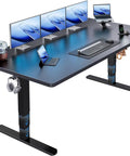Huanuo 70x35 Inch Electric Standing Desk With Three Stage Brushless Motor Black, featuring dual monitors and minimalistic design.