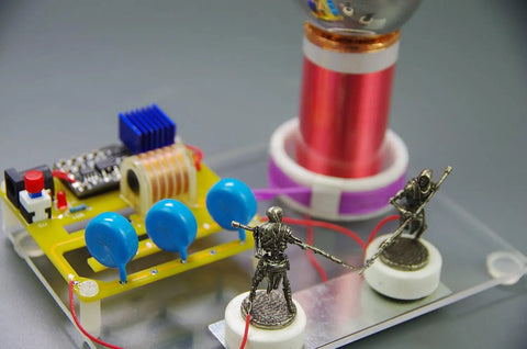 Tabletop Tesla Coil DIY Kit With Spark Gap High Voltage Science Educational Toy For Electrical Hobbyists Easy Assembly In About 1 To 2 Hours Includes Step By Step Guide And 12V Power Supply Prep, tabletop kit with blue capacitors and coil