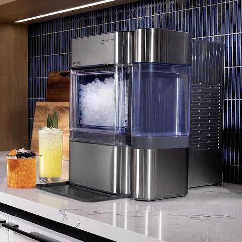 Front view of GE Profile Opal 2.0 nugget ice maker, stainless steel with clear ice bin and side water tank.