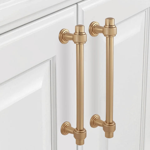 5 Inch Center-To-Center Champagne Bronze Cabinet Pulls installed on white cabinet doors, showing 6.2 Inch Length and zinc alloy material.