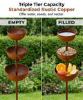 3 Tier Rain Catcher Garden Stake With Water Bowls For Birds Bird Bath And Butterfly Feeder Outdoor Yard Art Decor For Rain Harvest And Wildlife A Sturdy Metal Garden Ornament Turning Rain Into Living Art For Your Yard Cool Vibe, shown empty and filled with water, seeds, and fruit.