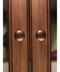Aspen Round Cabinet Knob In Light Bronze Finish, One And One Eighth Inch Diameter, Seven Eighths Inch Projection on wood cabinets