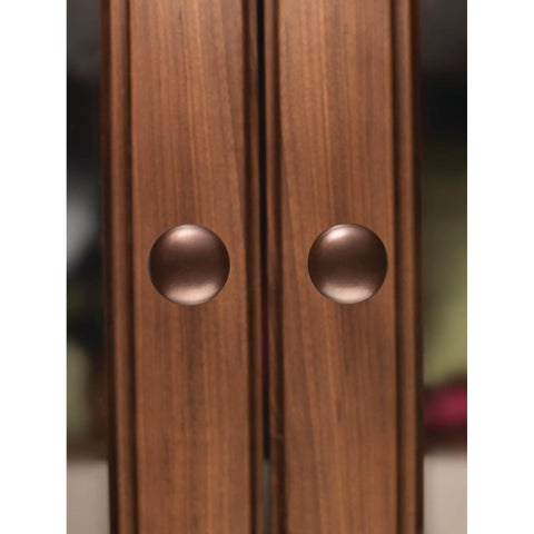 Aspen Round Cabinet Knob In Light Bronze Finish, One And One Eighth Inch Diameter, Seven Eighths Inch Projection on wood cabinets