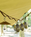 Heavy Duty Camping Lanyard Ten Feet With 19 Loops Daisy Chain Gear Hanger securing mugs and a lantern under a tent.