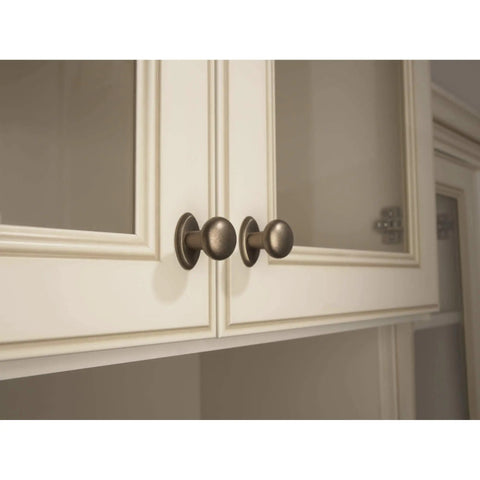 Aspen Round Cabinet Knob In Light Bronze Finish, One And One Eighth Inch Diameter, Seven Eighths Inch Projection on cabinet doors