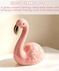 Glossy pink ceramic flamingo toilet bolt cover adds charm, part of Totally Vibes Super Sweet Pink Flamingo Ceramic Toilet Bolt Covers.