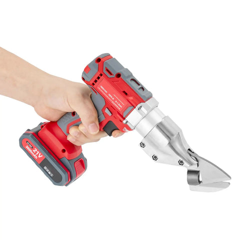 Heavy Duty 21V Brushless Cordless Metal Shear With Swivel Head And Variable Speed held in hand, showcasing chrome vanadium steel blades.