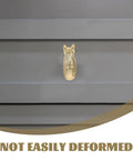 Real Deal Brass Animal Head Cabinet Knobs With Sweet Golden Finish Durable Drawer Pulls For Wardrobes Cupboards Easy Install Furniture Setup on gray drawer.