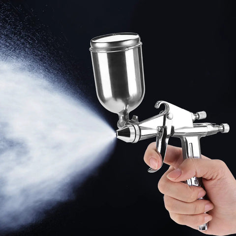 Compact Pneumatic Spray Gun With Tight 0.5mm Nozzle And 125ml Gravity Cup delivers atomization while spraying a fine mist.